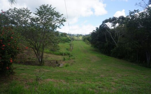Beautiful corner lot in Chontales de OSA with a magnificent hillside view and easy access.