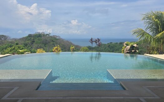 Elegant Ocean-View Estate with Solar-Powered Villa & Guest House in Paquera