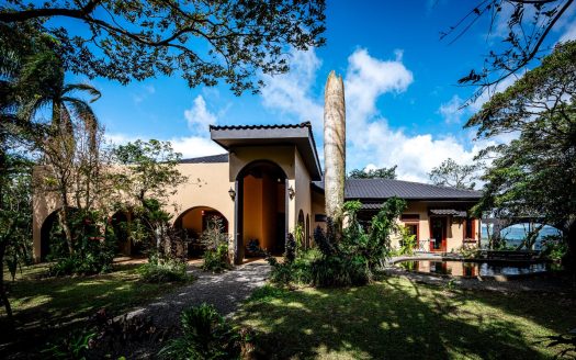 Lake & Volcano View, 3,800 sqft One Story Home, Two Jungle Cabins, Pavilion, Greenhouse, spring fed pond, Chicken Coop, Trails, and a Creek