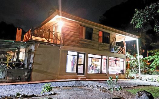 Tranquil Sanctuary: Charming Two-Story Wooden Home Near the River