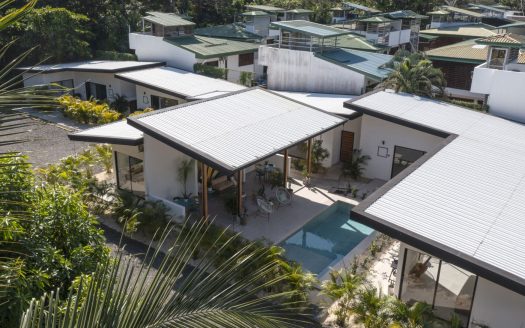 Turnkey Boutique Vacation Rental Investment – walk to beach!