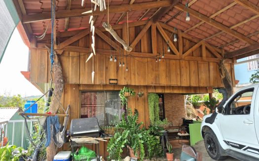 Well-built wooden home with green areas and a nice view
