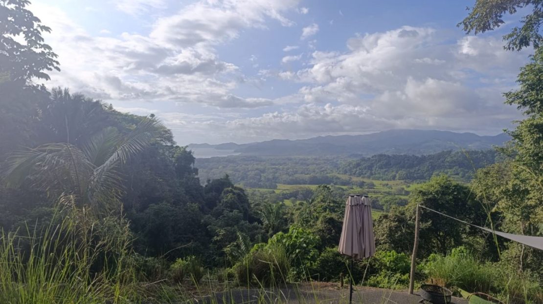 2.2ha Property with Camper & Panoramic Pacific Views Just Minutes from the Beach