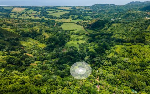 Enchanting Riverside Lot in Playa Hermosa with Waterfalls and Abundant Wildlife