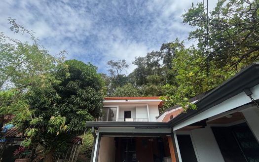 Spacious home located on a large 1.5 acre lot close to town center and highway 27