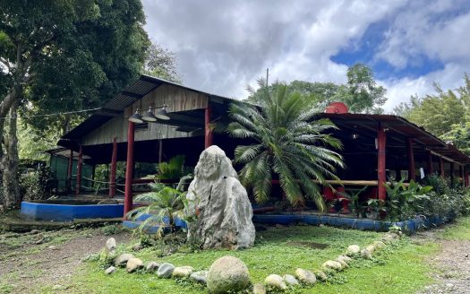 Endless Possibilities Await: 4.3 acres Oasis bordering river with Pond and Former Restaurant in Serene Setting