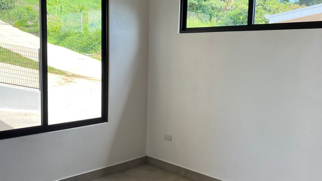 New modern home in Atenas and added lot for sale in private community