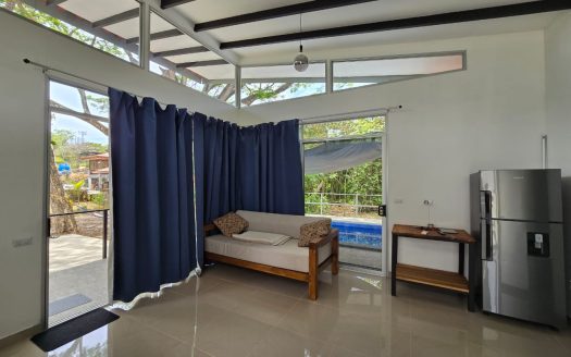 Inviting One-Bedroom Property with Pool Minutes from the Beach