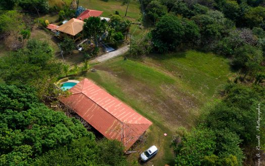 House with pool on 0.75 acre , close to the beach