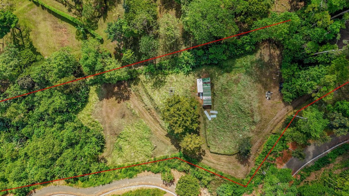 Bordering a Crystal Mountain River with Swimholes & a Waterfall