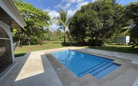 Charming Two-Story Home with Pool and Garden – 5,389.50 m² Lot