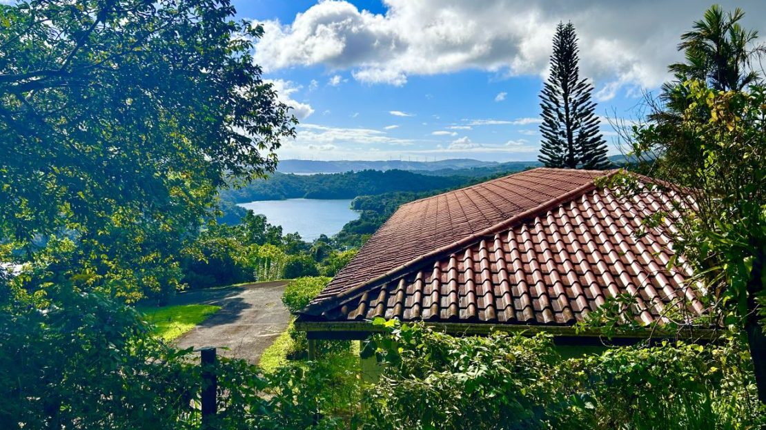 Charming Hillside Home with Panoramic Lake Arenal Views and Room to Expand
