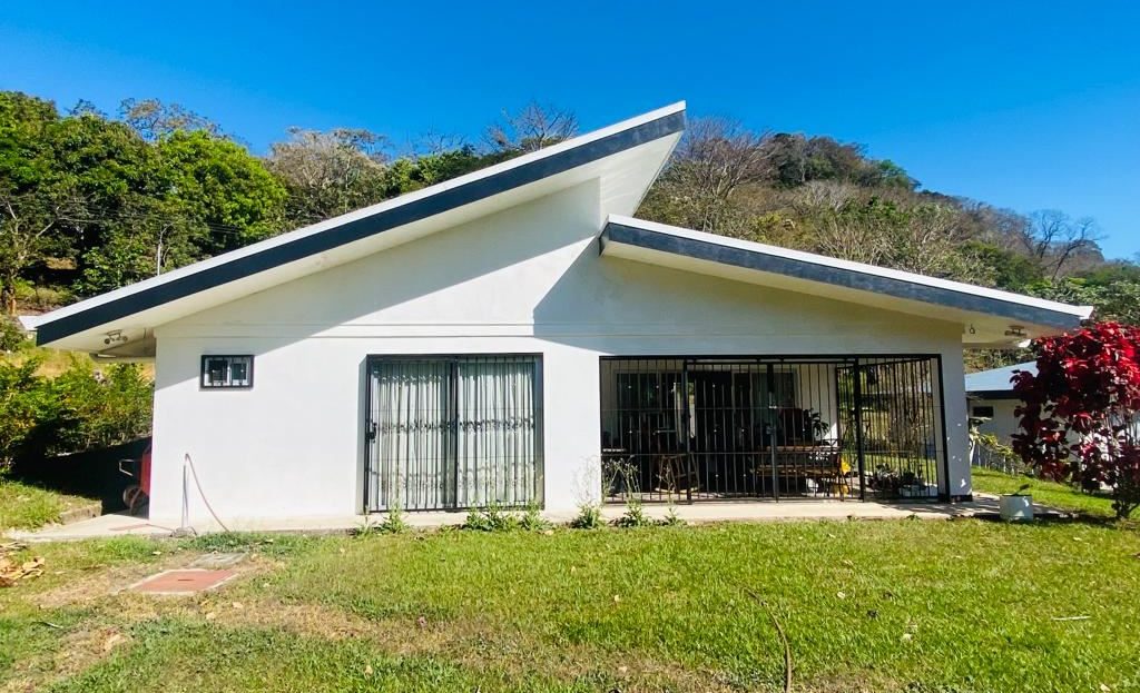 Home with large yard and orchard that touches a river