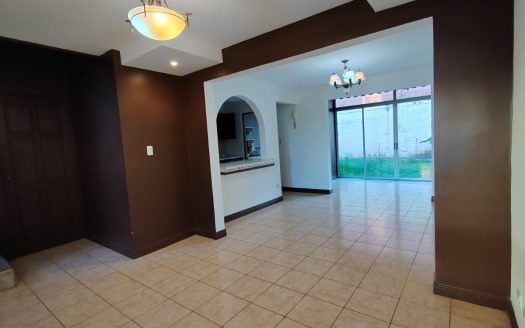 Functional two-story condominium with a two-car garage and private garden. An excellent option for living or investing.