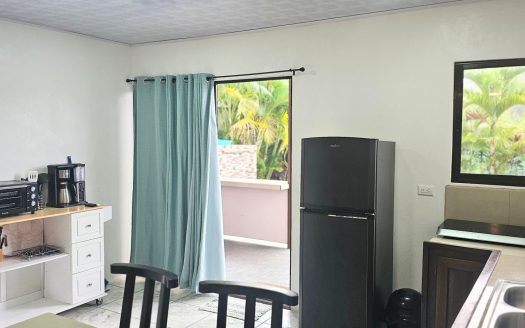 Turnkey 3BR Airbnb home for sale in gated community with a Pool just Minutes from La Fortuna