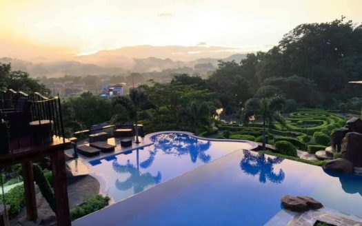 Large manicured property with very unique home in guarded La Guacima community