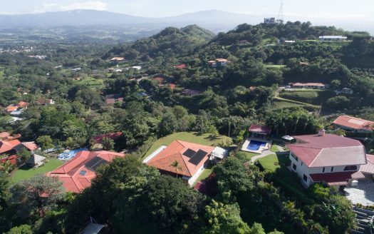 3 home property with 2 independent entries with present income in the most popular community.