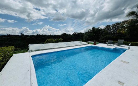 Home in a very private countryside community with big views