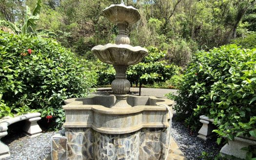 Colonial-Style Estate with Butterfly Garden, Pool & Smart Energy System in Gated Community