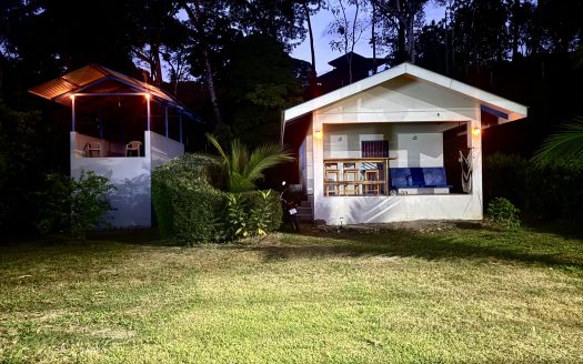 Titled Oceanview Home with Bodega Directly in Front of Waves
