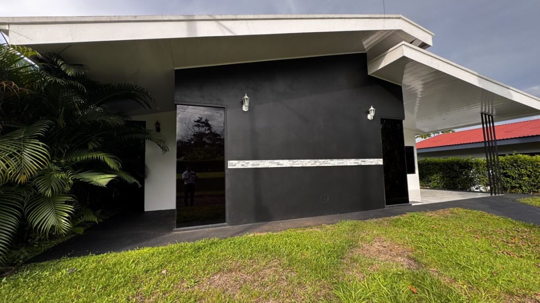Home in gated community with pool