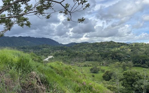 For Sale: Prime Lot with Stunning Mountain & River Views in Gated Community