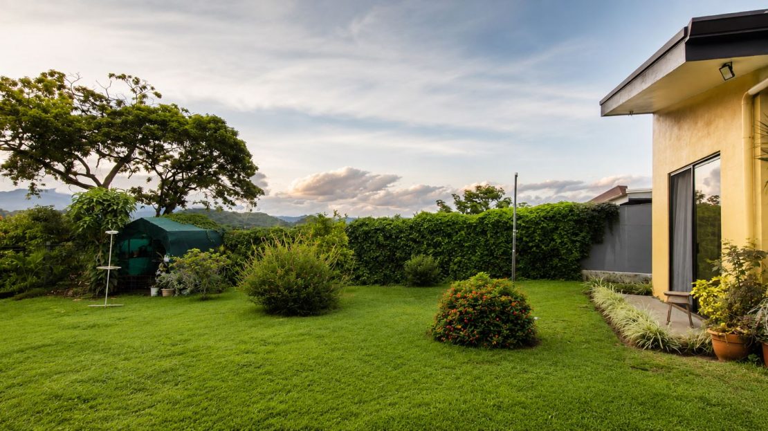 Charming Single-Level Home Near Atenas with Spacious Garden & City Views